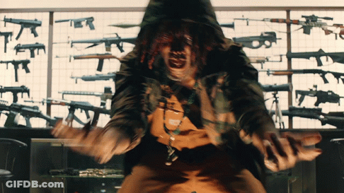 Man In Hooded Jacket Screaming At Gun Display GIF