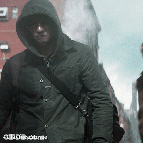 Man In Hooded Jacket Walking Down Street #Clayfacemovie GIF