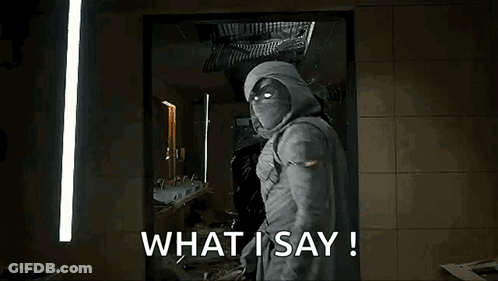 Man In Hooded Jacket With Glowing Eyes Saying What I Say! GIF