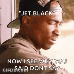 Man In Hoodie And Hat Looking Out Window GIF