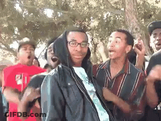 Man In Hoodie Facing Group GIF