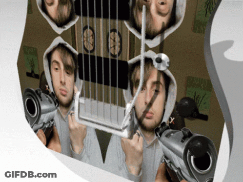 Man In Hoodie Holding Harp With Guns Pointing At Him GIF