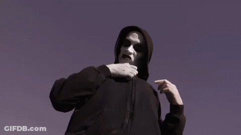 Man In Hoodie Holding Spoons In Pocket GIF
