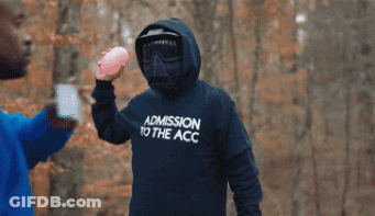 Man In Hoodie Saying ADN Holding Pink Ball GIF