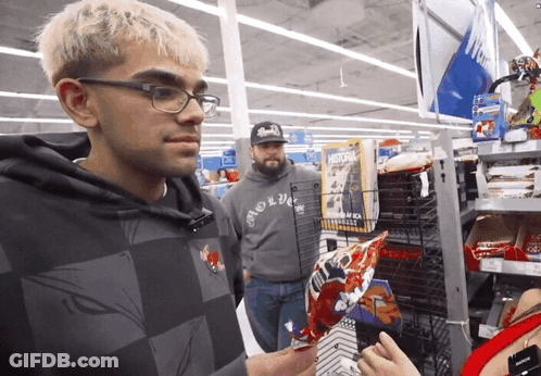 Man In Hoodie Saying Brooklyn Looking At Something GIF