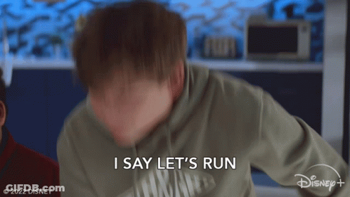 Man In Hoodie Saying Let's Run GIF