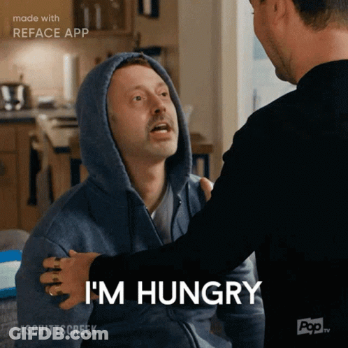 Man In Hoodie Says I'm Hungry Hugged By Another Man GIF