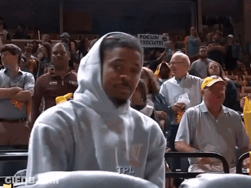 Man In Hoodie Sitting In Front Of Focus Execute Sign GIF