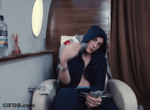 Man In Hoodie Sitting With Aquafina Water GIF