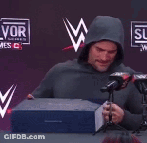 Man In Hoodie Thumbs Up At Microphones GIF