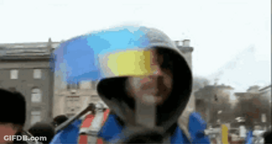 Man In Hoodie Waving Flag Of Ukraine GIF