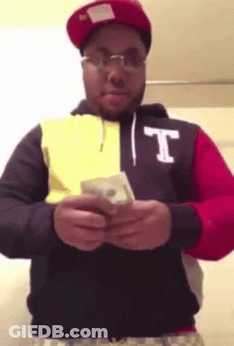 Man In Hoodie With Letter T Holding Money GIF