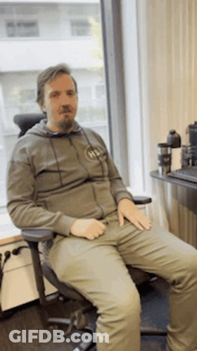 Man In Hoodie With NS GIF