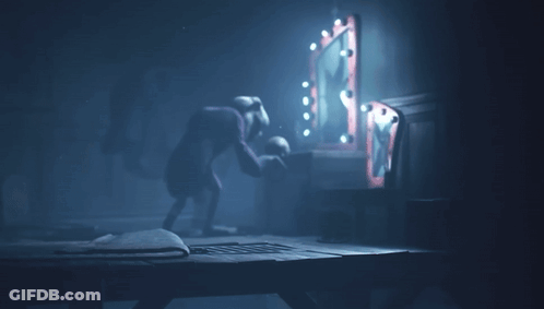 Man In Horse Mask In Front Of Mirror GIF