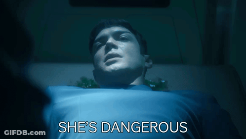Man In Hospital Bed Saying She's Dangerous GIF