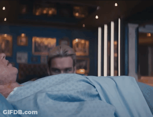 Man In Hospital Bed With Blue Blanket GIF