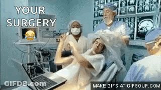 Man In Hospital Bed With Laptop During Surgery GIF