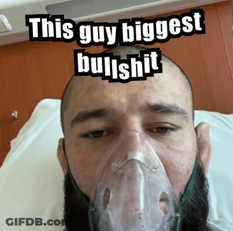 Man In Hospital Bed With Oxygen Mask GIF