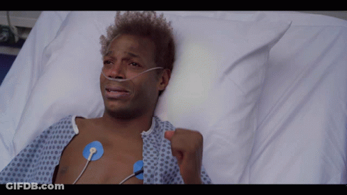 Man In Hospital Bed With Oxygen Mask On Neck GIF