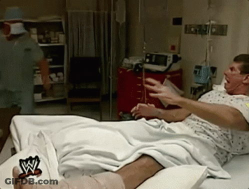 Man In Hospital Bed With W Logo On Foot GIF
