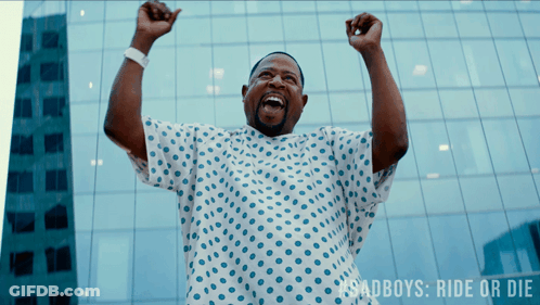 Man In Hospital Gown Arms Raised Ride Or Die GIF