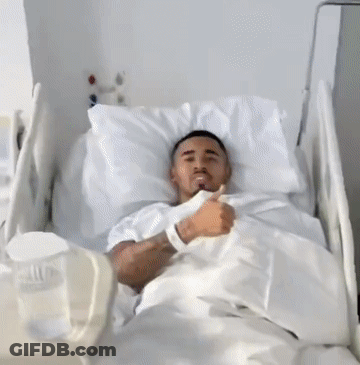 Man In Hospital Gown Giving Thumbs Up GIF