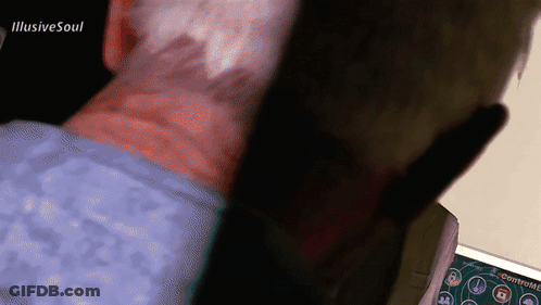Man In Hospital Gown Looking At Connect Me Screen GIF