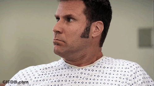 Man In Hospital Gown Looking Left GIF