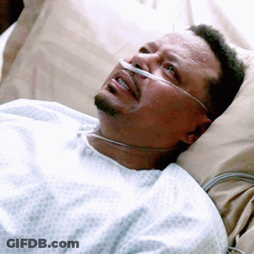 Man In Hospital Gown With Oxygen Tube In Nose GIF