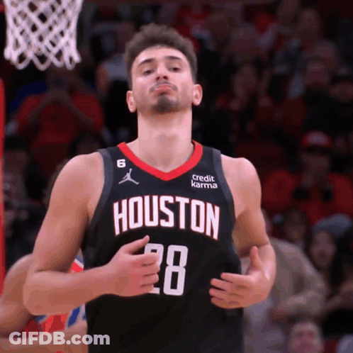 Man In Houston 28 Jersey In Front Of Basketball Net GIF