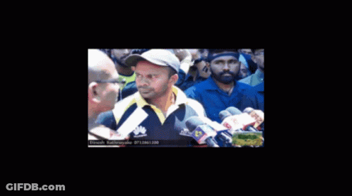 Man In Huawei Shirt Talks To Reporter GIF
