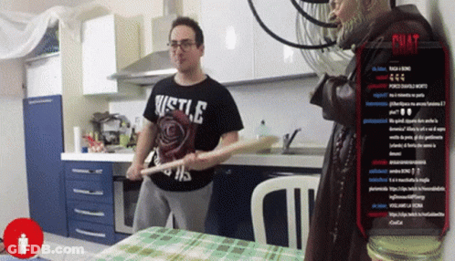 Man In Hustle Shirt Holding Bat GIF