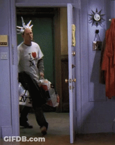 Man In I Love NY Shirt In Doorway GIF