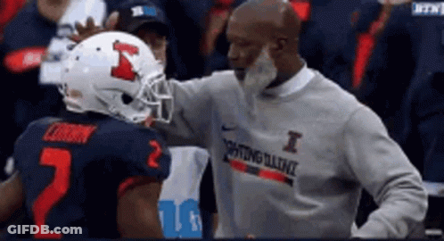 Man In I Sweatshirt Talking To Football Player GIF