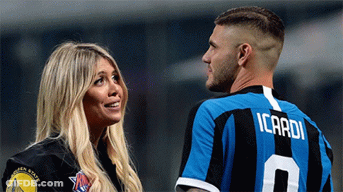 Man In Icardi Jersey Next To Woman In Warriors Shirt GIF