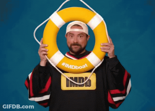 Man In Imdb Shirt Holding Life Preserver GIF