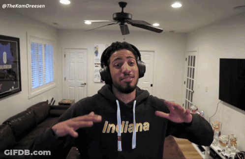 Man In Indiana Hoodie And Headphones GIF
