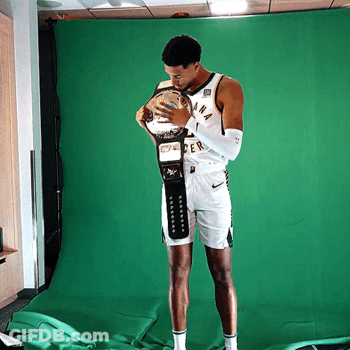 Man In Indiana Jersey Holding Trophy GIF