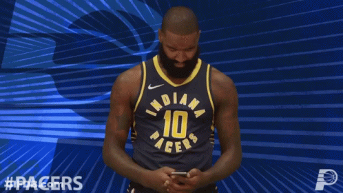 Man In Indiana Pacers Jersey Looking At Phone GIF