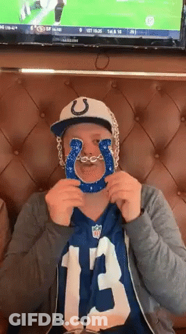 Man In Indianapolis Colts Jersey Holding Blue Horseshoe GIF
