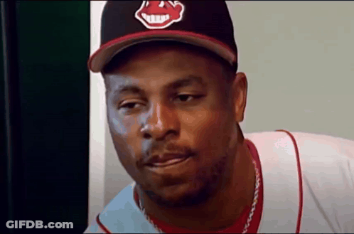 Man In Indians Hat And White Shirt GIF