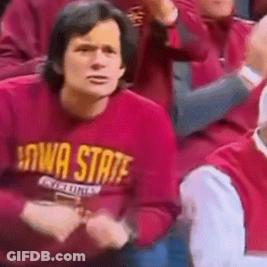Man In Iowa State Sweatshirt Sitting In Crowd GIF
