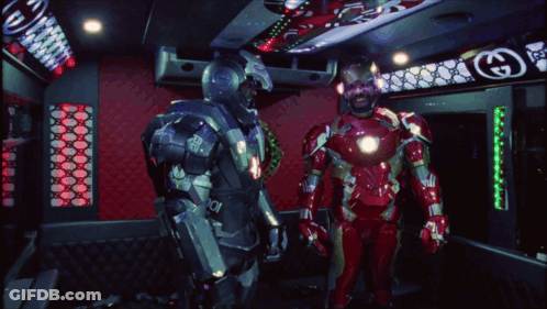Man In Iron Man Costume Next To Another Man GIF