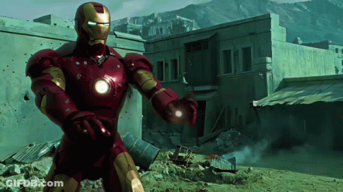 Man In Iron Man Suit At Destroyed Building GIF