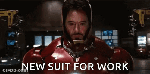 Man In Iron Man Suit Wearing Helmet GIF