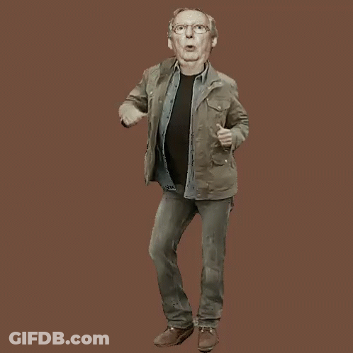 Man In Jacket And Jeans Dancing With Mouth Open GIF