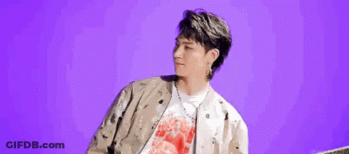 Man In Jacket And Red Shirt On Purple GIF