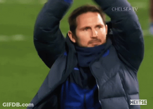Man In Jacket In Front Of Crowd With Chelsea GIF