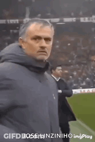 Man In Jacket Making Funny Face GIF