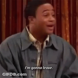 Man In Jacket Saying I'm Gonna Leave In Front Of Curtain GIF
